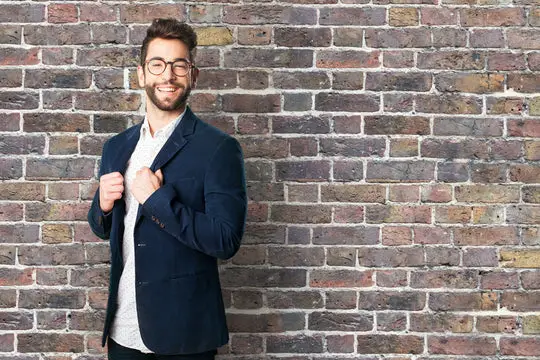 man choosing what to wear dress shirt or casual shirt